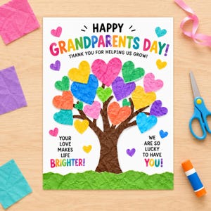 May include: A white greeting card with the text HAPPY GRANDPARENTS DAY! THANK YOU FOR HELPING US GROW! A brown tree trunk with colorful, textured paper hearts as leaves. Text reads YOUR LOVE MAKES LIFE BRIGHTER! and WE ARE SO LUCKY TO HAVE YOU!