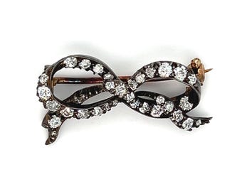 Broche/colgante de lazo de diamantes antiguo en platino/oro amarillo de 18 quilates - 1,00 ct.