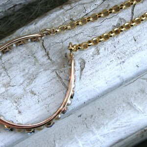 Vintage 14K Yellow Gold Pearl and Sapphire Horseshoe Necklace. image 4