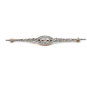 Antique Platinum/ 18K Yellow Gold Diamond Bar Brooch.