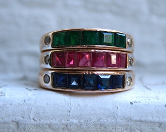 Vintage 14K Yellow Gold Wide Band Ring with Rubies, Emeralds, Diamonds, Sapphires, and Diamonds.