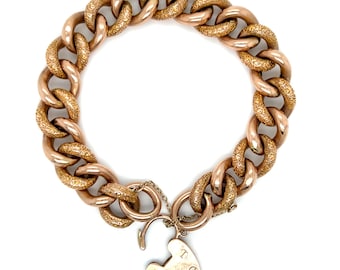 Pulsera antigua victoriana de oro rosa de 9 quilates con candado en forma de corazón.