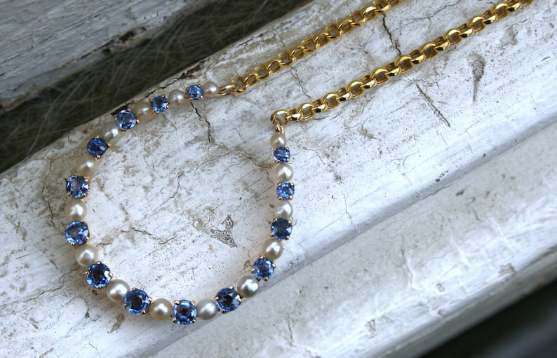 Vintage 14K Yellow Gold Pearl and Sapphire Horseshoe Necklace. image 2