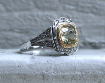 Natural Yellow Sapphire and Diamond Halo Engagement Ring in Platinum.