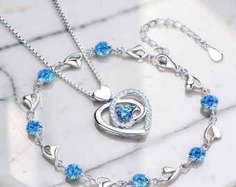 Hartvormige hangerketting en armbandenset voor dames, blauwe of transparante kristallen zilveren hartsieraden, een verfijnd liefdescadeau voor haar, een perfect cadeau voor mama.