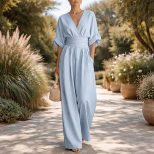 Eleganter Frauen-Jumpsuit mit Taschen, weites Bein, V-Ausschnitt, Gürtel, lässiges, komfortables Outfit