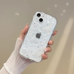 Funda para iPhone con mariposa 3D, cubierta transparente con purpurina cristalina, protección de silicona suave.