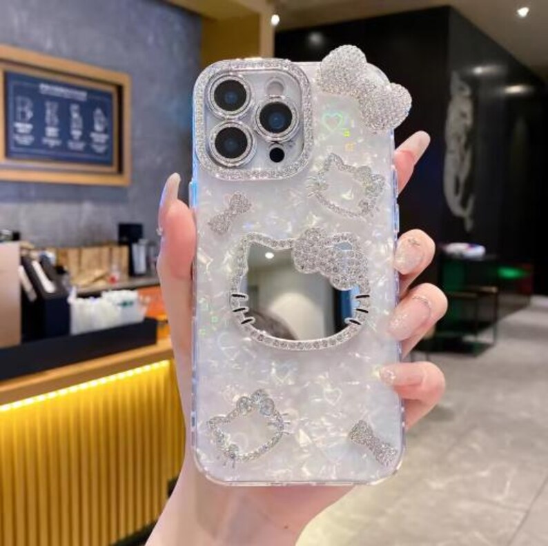 Cute Hello Kitty Makeup Mirror Phone Case, 3D Cartoon Sanrio Glitter Cover, Shockproof Hard Case for iPhone 12–17 Pro Max Color B