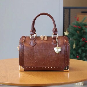 Modieuze Boston-straathandtas met retro klinknagels