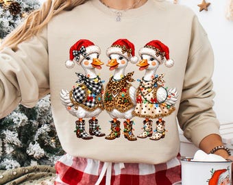 Sudadera navideña de ganso estilo western, sudadera navideña con estampado de leopardo, cuadros y lunares, gorro de Papá Noel y botas vaqueras, camiseta navideña vaquera divertida