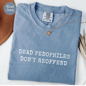 May include: A set of three ceramic mugs with a speckled, matte finish. The mugs are in shades of cream, light gray, and dark gray. Each mug has a simple, modern design and a rounded handle.