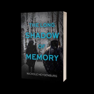 May include: A book with the title "THE LONG SHADOW OF MEMORY" by Nichole Heydenburg. The cover shows a snowy forest scene with two figures and the title in teal. The book is a hardcover.