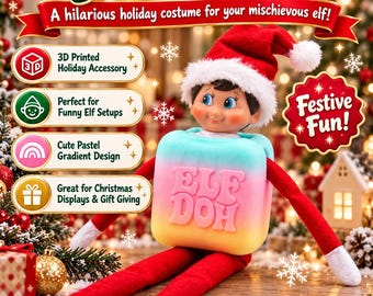 Peut inclure: Un lutin jouet portant un bonnet rouge et blanc et un costume carré à dégradé pastel avec le texte ELF DOH en relief sur le devant. Le lutin a des bras et des jambes rouges avec des poignets blancs. L'image contient des textes comme Elf Squishy, Elf Doh Costume, 3D Printed Holiday Accessory, Festive Fun et Available Now.