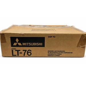 May include: A brown cardboard box featuring the Mitsubishi logo and model number LT-76. The box includes text stating "Designed and Engineered by Mitsubishi Electric Corporation, Assembled in Taiwan, Fabriqué à Taiwan."