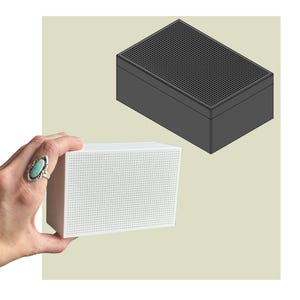 May include: A rectangular box with a perforated grid pattern on its front face. The object is shown in two variations: one white version held in a hand and a second dark gray version depicted as a three-dimensional isometric digital rendering.
