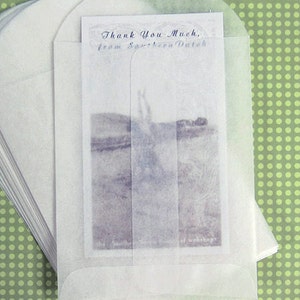 May include: A stack of white translucent envelopes with a printed card inside. The card features a landscape image and the text "Thank You Much, from Southern Dutch". The background is a light green dotted pattern.