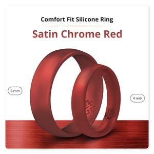 Puede incluir: Dos anillos de silicona en color rojo cromo satinado. El anillo más grande tiene 6 mm de ancho y el más pequeño 4 mm de ancho.
