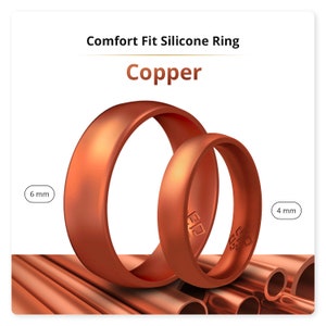 May include: Two copper-colored silicone rings, one 6 mm wide and the other 4 mm wide, are stacked on top of each other. The rings are on a background of copper pipes.