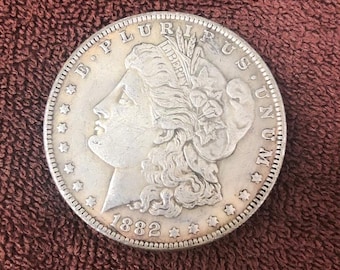 A rare 1882 Morgan silver dollar—a vintage American Liberty silver dollar coveted by collectors.