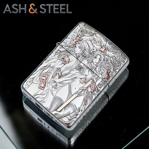 May include: A silver lighter with an engraved design featuring two female figures with long hair and a sword. The lighter has the text "ASH & STEEL" at the top. The design is detailed with pink and gold accents.