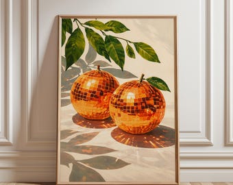 May include: A framed art print featuring two orange disco ball spheres with green leaves and a branch. The artwork has a light background with leaf shadows, and is set in a wooden frame.