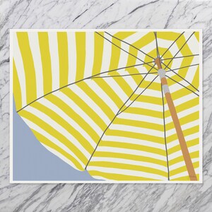 May include: An illustration of a beach umbrella with yellow and white stripes, seen from underneath. The wooden pole and supporting structure are visible. The background is light blue. The artwork is on a white canvas.