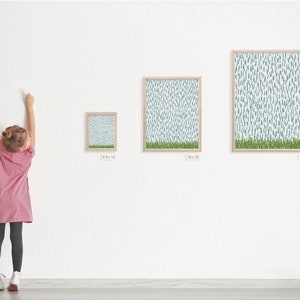 May include: Three framed prints of a blue and green abstract pattern with a white background. The prints are in different sizes and are hanging on a white wall. The smallest print is 9.5 inches by 12 inches, the middle print is 18 inches by 23 inches, and the largest print is 25 inches by 31 inches.