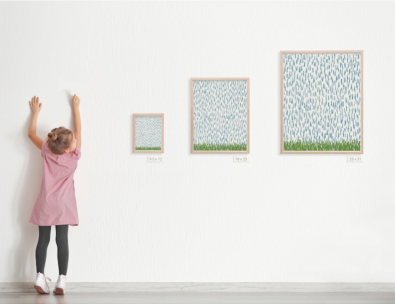 May include: Three framed prints of a blue and green abstract pattern with a white background. The prints are in different sizes and are hanging on a white wall. The smallest print is 9.5 inches by 12 inches, the middle print is 18 inches by 23 inches, and the largest print is 25 inches by 31 inches.