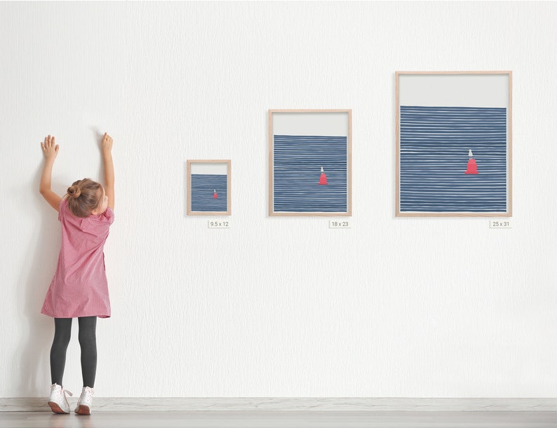 May include: Three framed prints of a minimalist abstract design featuring a red triangle on a blue background with white lines. The prints are in different sizes, with the largest print measuring 25 inches by 31 inches.