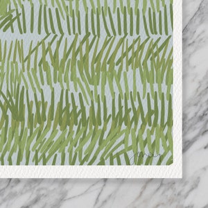 May include: Abstract art print with a green and blue pattern of lines on a white background. The print is signed "Joney" in the bottom right corner.
