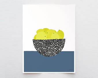 May include: A graphic art print featuring a bowl filled with bright yellow lemons. The bowl has a black and white polka dot pattern. The composition is set against a white background with a solid dark blue horizontal band at the bottom.