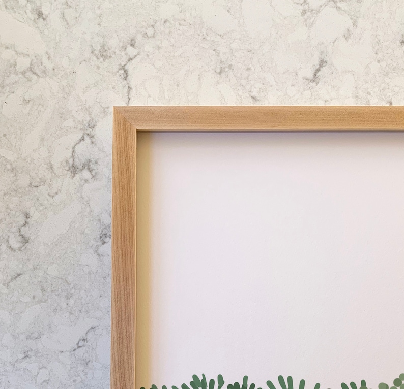 May include: A light wood picture frame with a white mat. The frame is empty and ready for a picture.