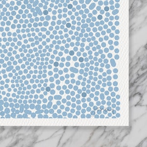 May include: A white background with a pattern of light blue circles.
