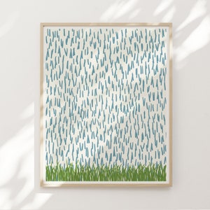 May include: A framed print with a white background and a pattern of blue lines. The bottom of the print has a row of green grass.
