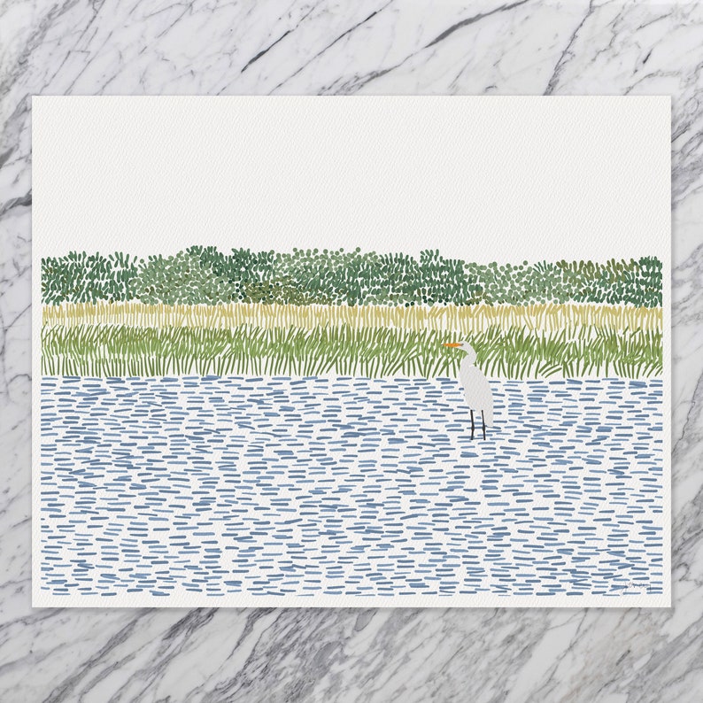 May include: A white egret stands in a blue body of water with a green grassy shore in the background. The water is depicted using small blue lines and the grass is depicted using small green lines.
