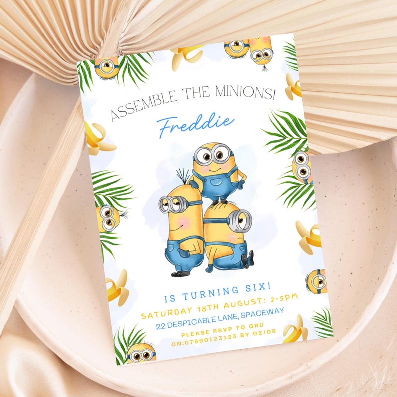 May include: A birthday party invitation featuring Minion characters. The invitation has the text "ASSEMBLE THE MINIONS! Freddie IS TURNING SIX!" with event details. The design includes Minion illustrations, bananas, and palm leaves on a white background.