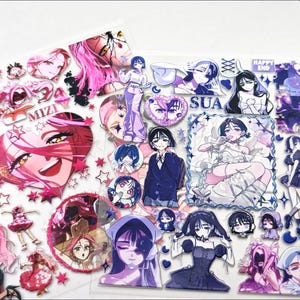 May include: Two sticker sheets featuring anime-style illustrations. The left sheet displays pink-toned characters, stars, and the text MIZI. The right sheet features blue-toned characters, the text SUA, and the text HAPPY END, with various character poses.