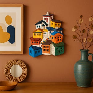 Puede incluir: Un juego de tres tazas de cerámica con un acabado moteado y mate. Las tazas son de color crema, gris claro y gris oscuro. Cada taza tiene un diseño simple y minimalista, ideal para café o té.