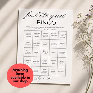 May include: A white paper game card titled Find the Guest BINGO with a grid of twenty-five squares containing various prompts and a ring icon. The text Lucy & Tom appears at the bottom. A red circular sticker states Matching items available in our shop.