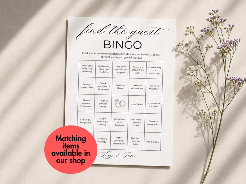 May include: A white paper game card titled Find the Guest BINGO with a grid of twenty-five squares containing various prompts and a ring icon. The text Lucy & Tom appears at the bottom. A red circular sticker states Matching items available in our shop.