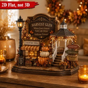 Pode incluir: Uma decoração de mesa plana em 2D com uma placa Harvest Glen, um poste de luz iluminado, uma loja de tortas, três abóboras empilhadas e um gazebo. Placas indicam Cider Barn, Town Hall e Pumpkin Market entre folhagens de outono.