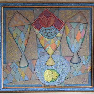 May include: A framed oil painting depicting three tall, diamond-patterned vessels in shades of blue, orange, and yellow. A single halved lemon rests on a circular blue surface in the foreground. The artwork features a textured, geometric style.