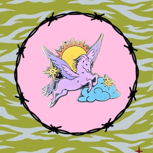 May include: A whimsical pin featuring a lavender pegasus with silver accents, a yellow sun, and a blue cloud. The design is set against a pink background, encircled by a black barbed wire frame, and a green and gray zebra-striped background.