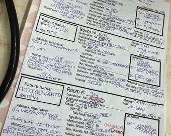 May include: A pink clipboard with handwritten medical records for two patients. The clipboard has a gold clip and a stethoscope is visible in the background. The records include patient names, ages, admission dates, reasons for admission, medical history, allergies, medications, and other medical information.