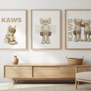 May include: A set of three ceramic mugs with a speckled, matte finish in cream, light grey, and dark grey. Each mug has a simple, minimalist design, suitable for coffee or tea.