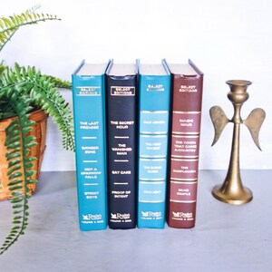 May include: Four vintage paperback books with blue and brown covers. The books are part of a series called "Select Editions". The titles of the books are "The Last Promise", "The Secret Hour", "Blue Heaven", and "Magic Hour".