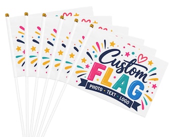May include: A set of six white handheld flags on white plastic poles with gold-colored finials. Each flag features a colorful graphic design with stars, hearts, and fireworks, and the text Custom FLAG PHOTO TEXT LOGO in blue and pink.