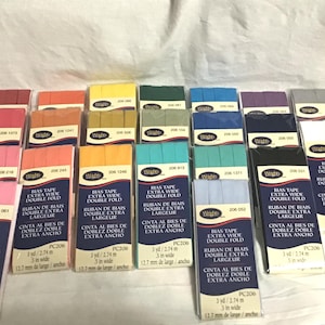 May include: A set of three ceramic mugs with a speckled, matte finish. The mugs are in shades of cream, light gray, and dark gray. Each mug has a simple, minimalist design and a rounded handle. Perfect for coffee or tea.