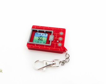 Porte-clés Digimon Virtual Pet découpé au laser