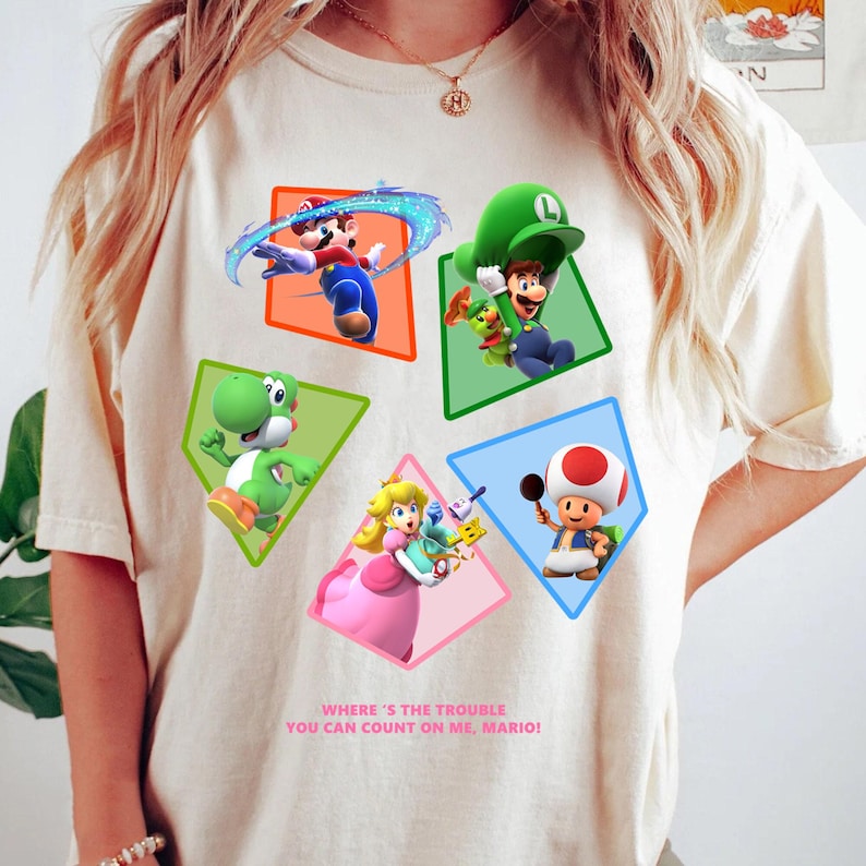 May include: A white ceramic mug with a black handle and the text "But first, coffee" in a black, handwritten-style font. The mug is on a white surface.